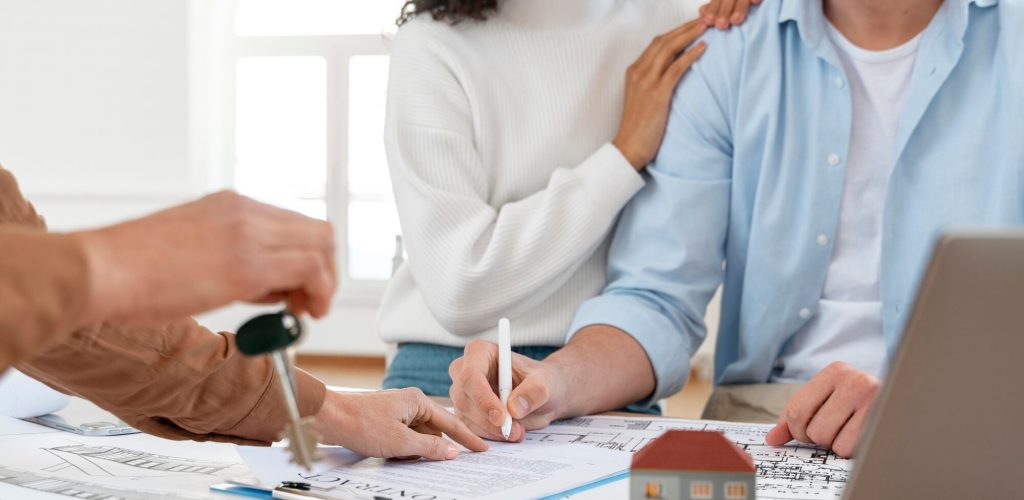 smiley-couple-signing-contract-new-house_23-2148895489